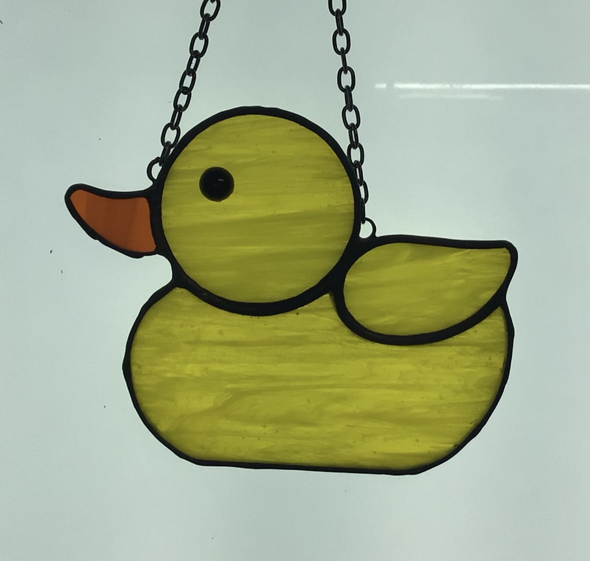 Yellow stained glass duck suncatcher