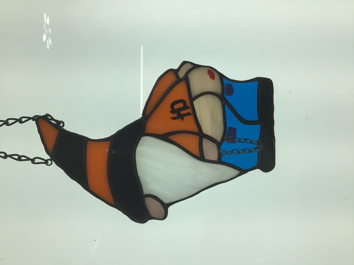 Orange and blue stained glass garden gnome